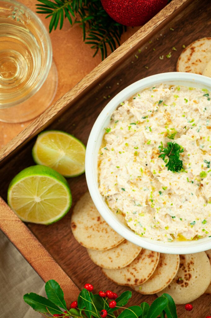 Dip into a bowl on a platter with a few blinis, a lime and a glass of wine.