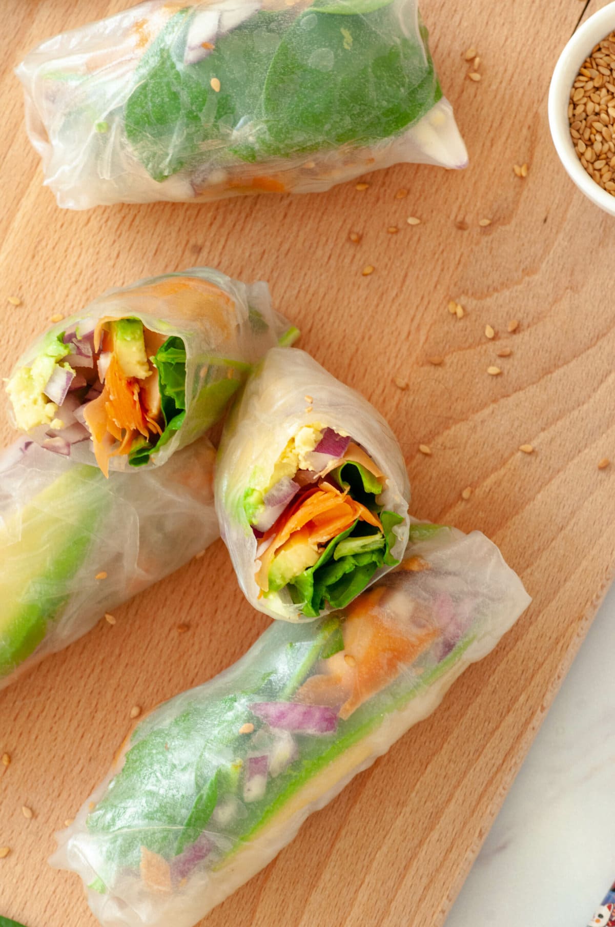Zoom in on a spring roll cut in half, with the filling visible.