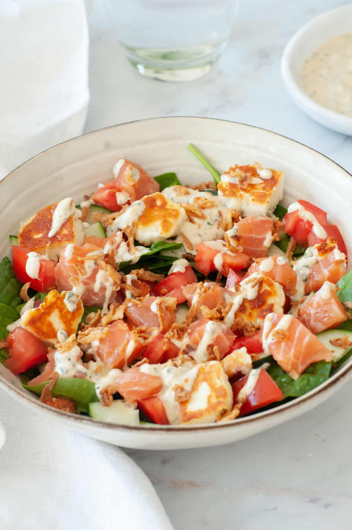 Salmon, tomato, halloumi & yogurt salad