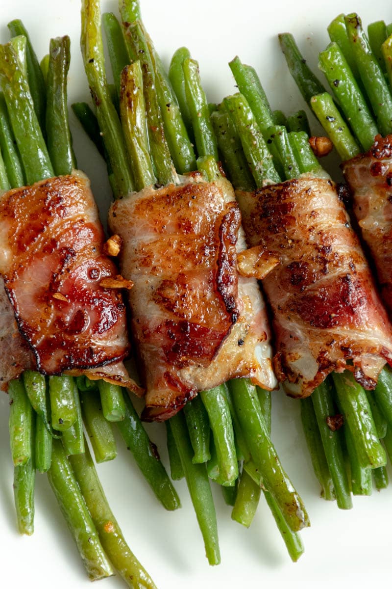 Green bean bundles wrapped in smoked bacon.