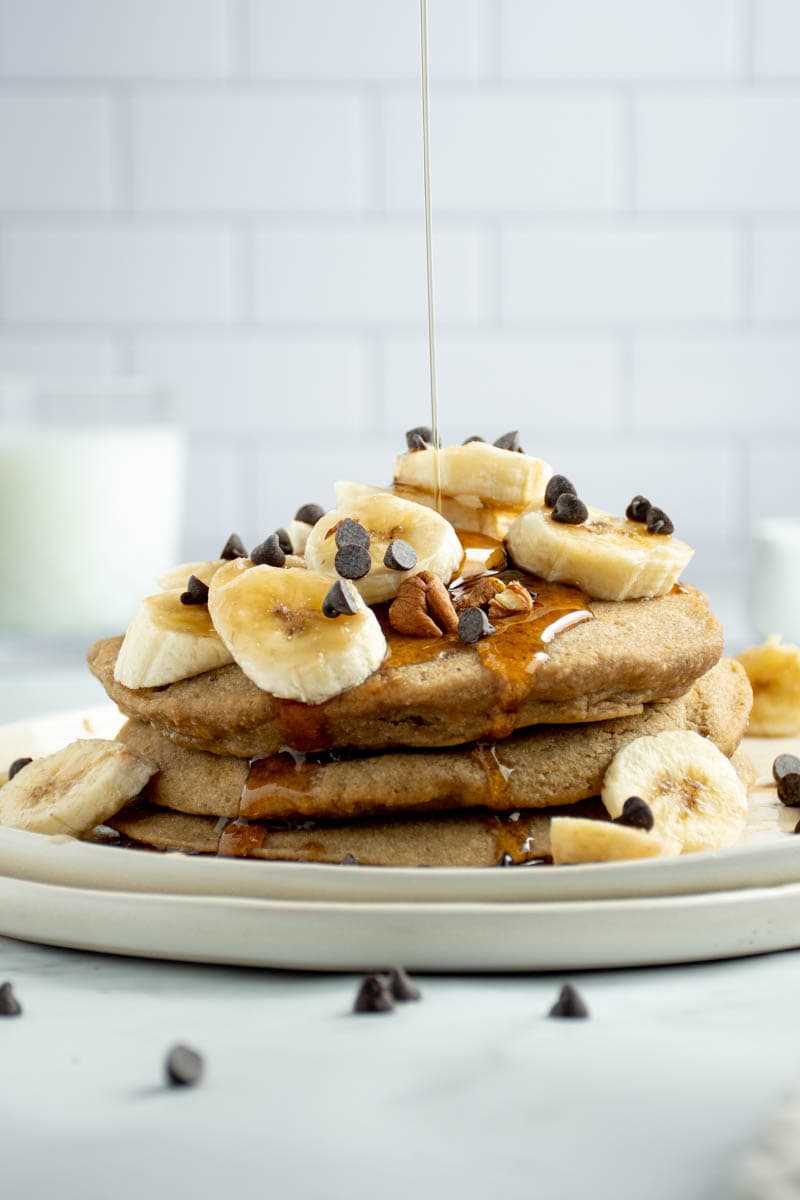 Banana pancakes with a drizzle of maple syrup.