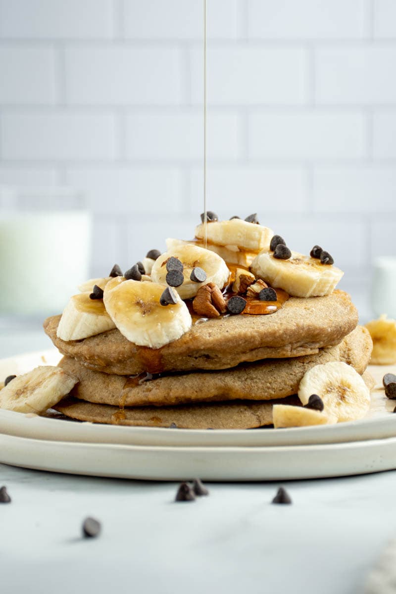 Banana pancakes with a drizzle of maple syrup.