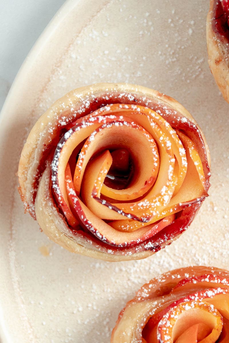 Apple rose on a plate.