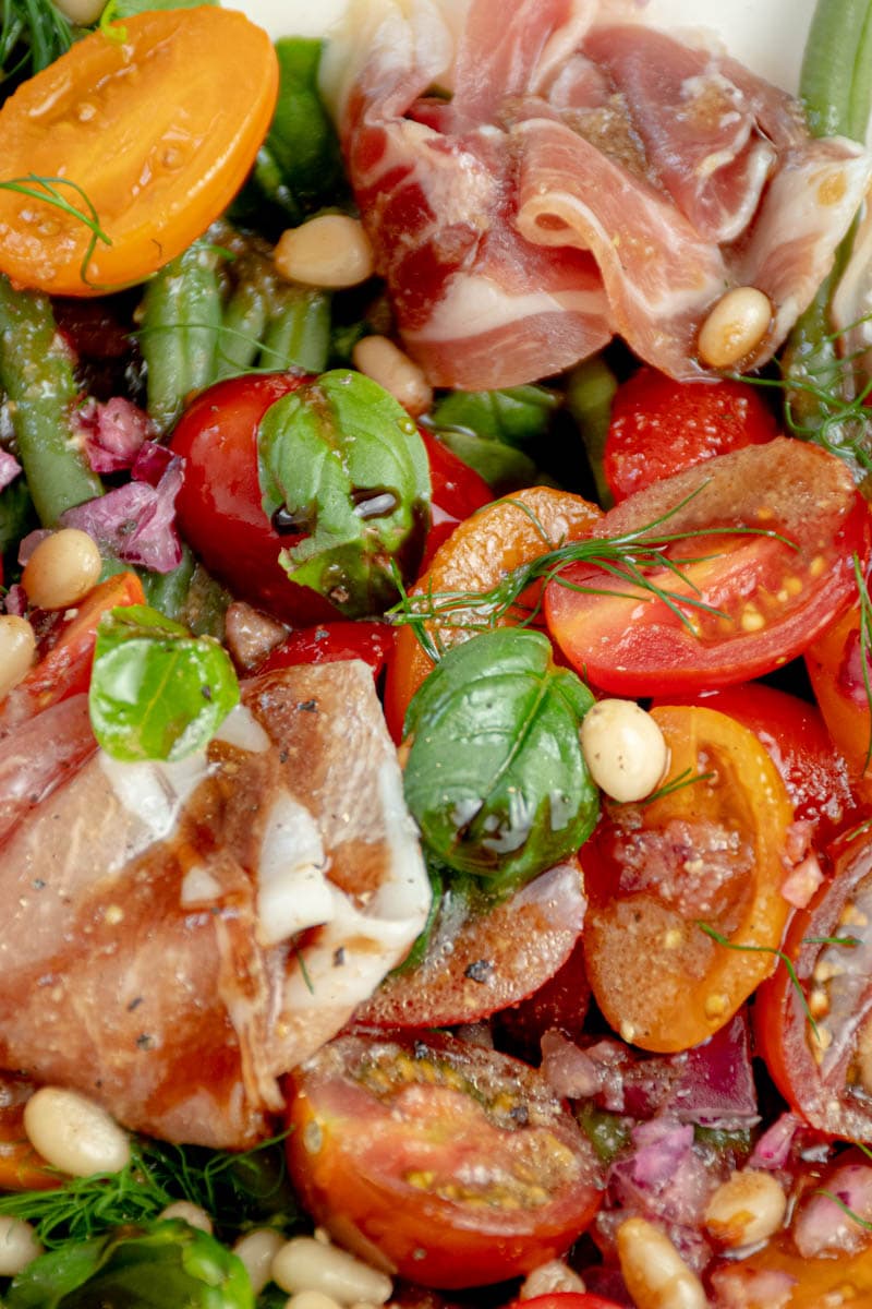 Zoom in on this salad of green beans, cherry tomatoes, Parma ham and basil.
