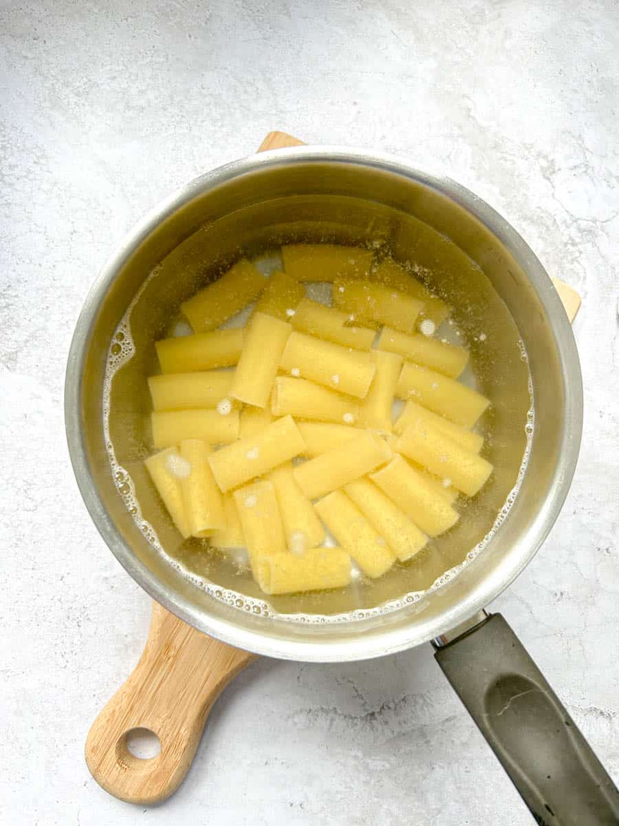 Pasta cooking in a saucepan.