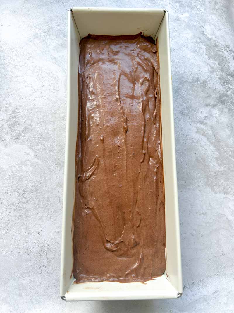 Chocolate mixture in a rectangular mold.