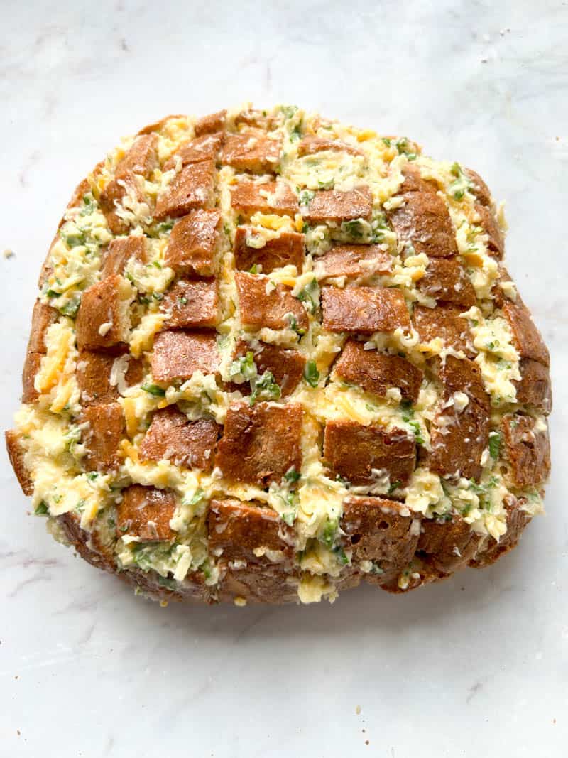 Crack bread stuffed with mozzarella, cheddar cheese, parsley and garlic.