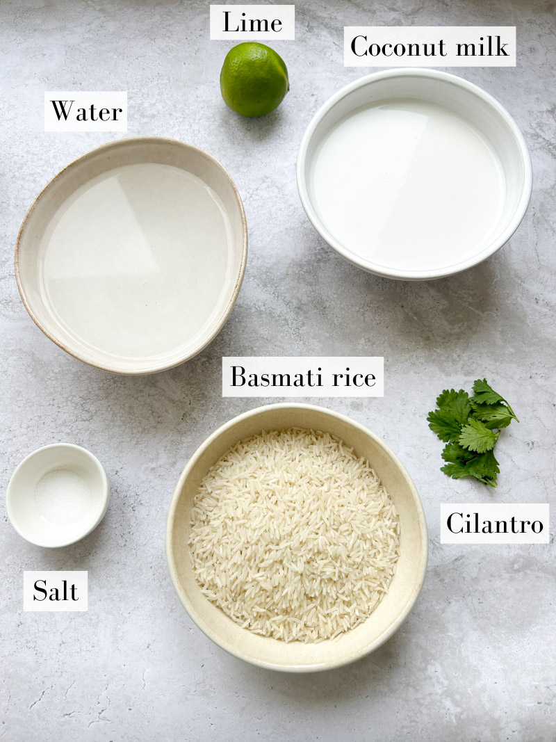 Ingredients of coconut lime rice in white and beige bowls.