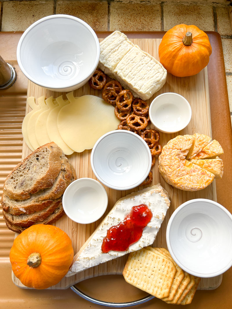 Slices of bread, crackers and savory cookies added to the Halloween charcuterie board.