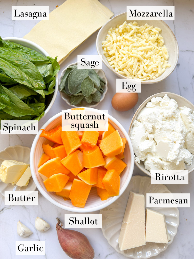 Ingredients of butternut squash lasagna rolls in white and beige bowls.