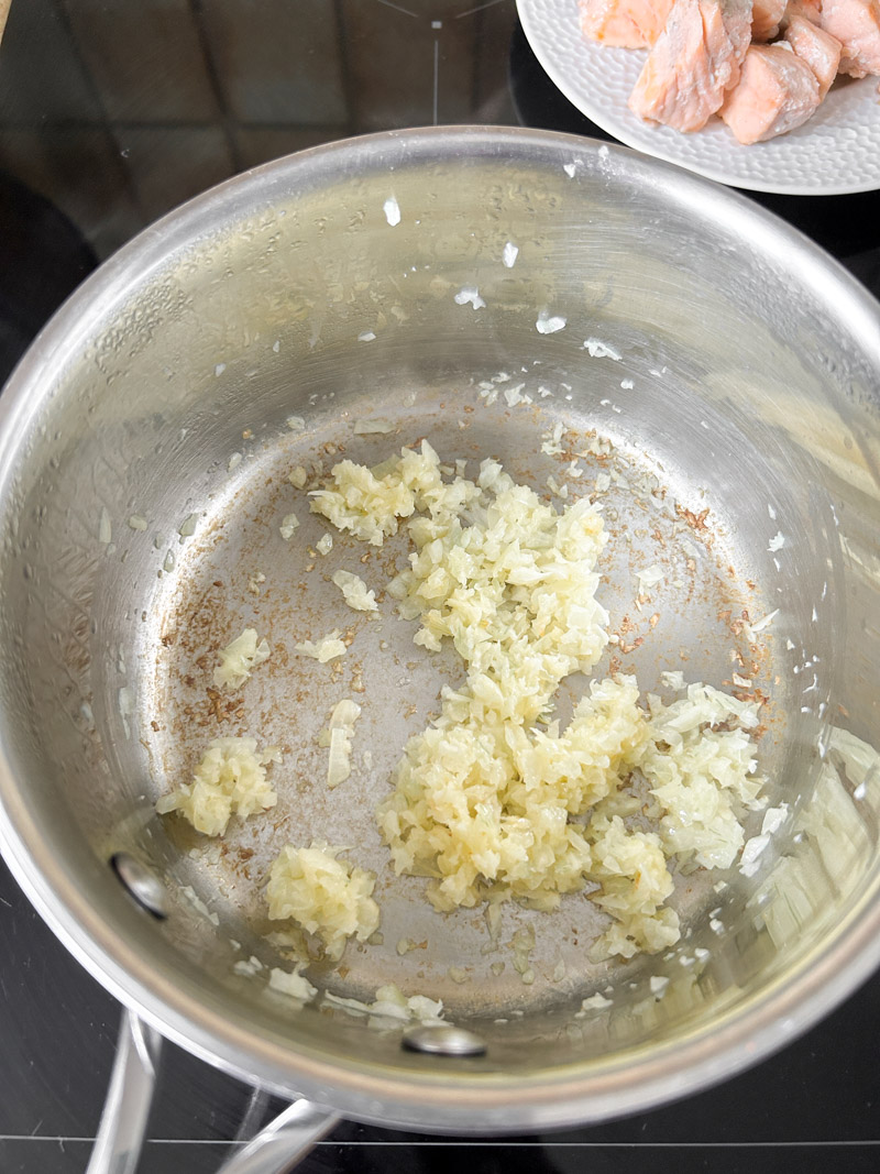 Minced garlic and onion cooked in the saucepan.