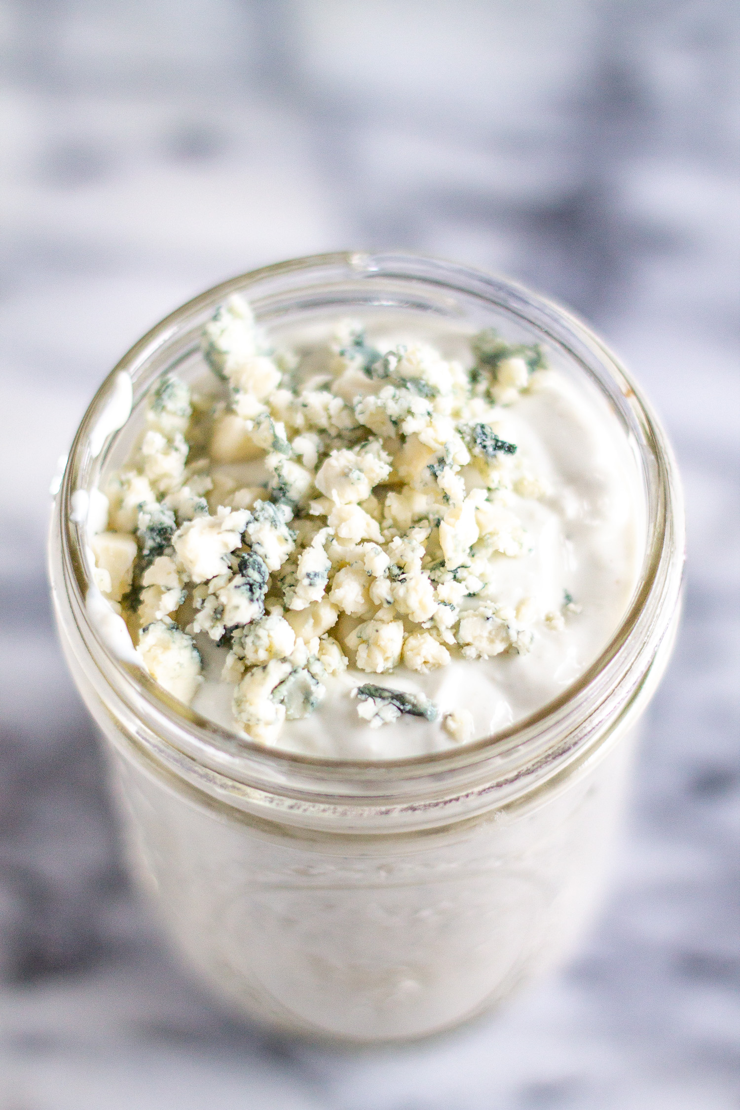 Blue cheese dressing in a glass.