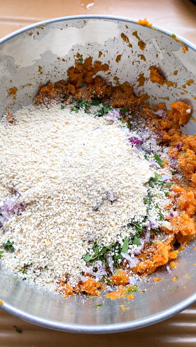 Breadcrumbs added to the cooked and crushed sweet potatoes.