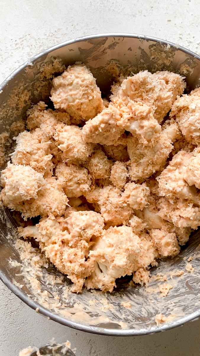 Cauliflower florets coated with batter and Panko breadcrumbs.