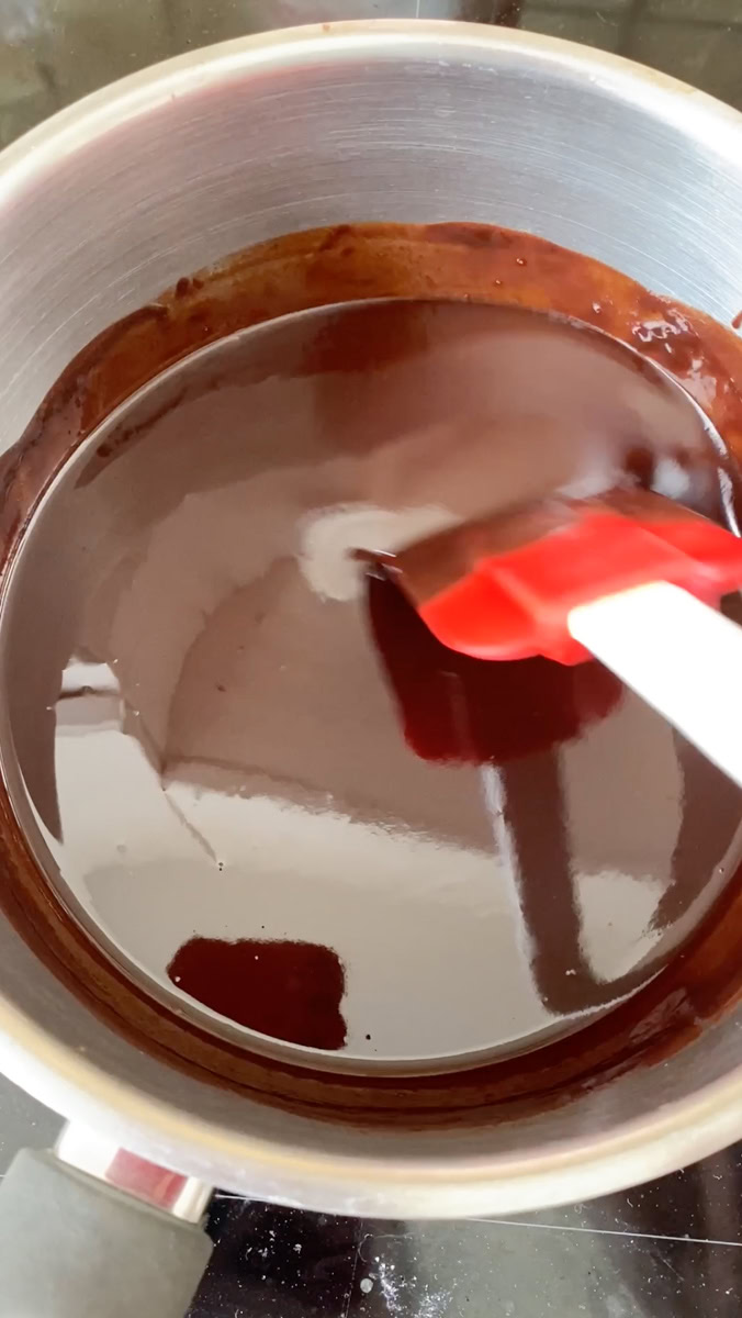 Dark chocolate and butter melted in a saucepan.