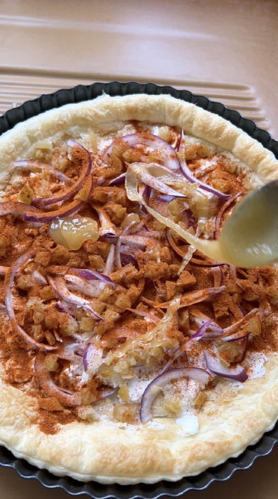 Paprika and honey drizzle added to puff pastry.