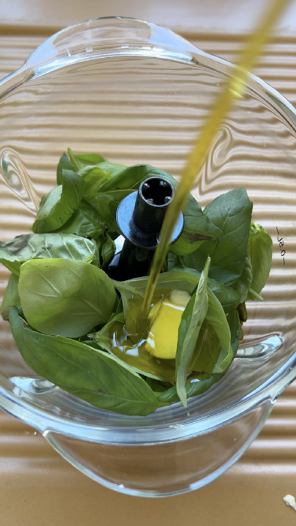 Ingredients for pistachio pesto in a blender.